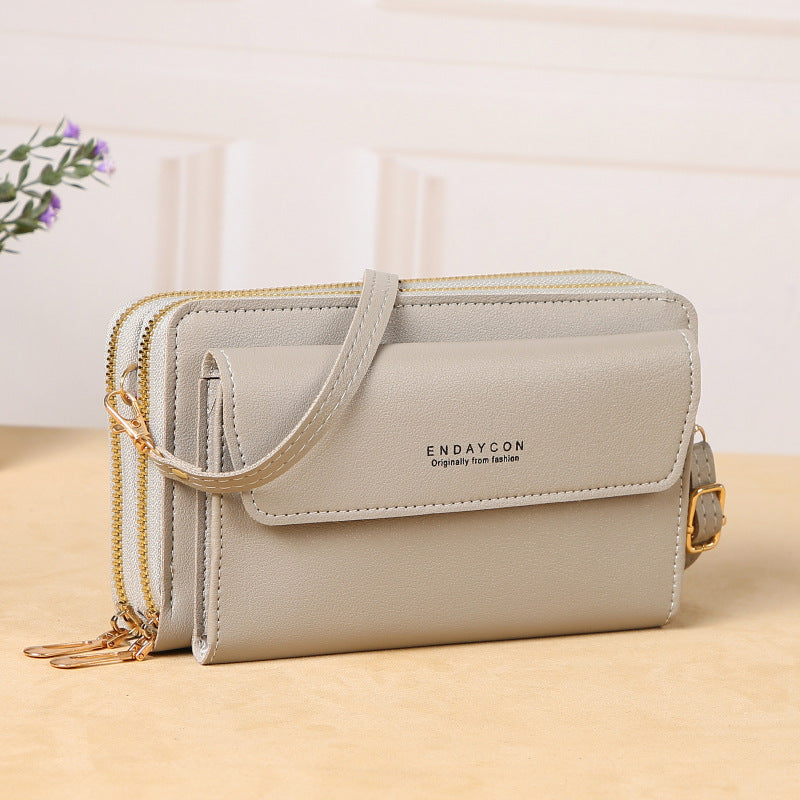 The Minimalist Multi-Compartment Crossbody Phone Wallet